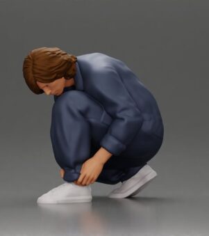 Worker injumpsuit Squatting Down